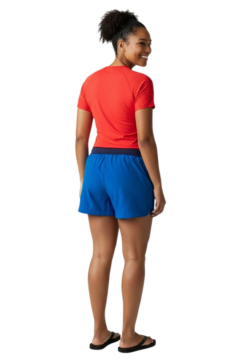 RISE Guard Female Roll Short in royal blue polyester with a navy waistband and white logo detail.