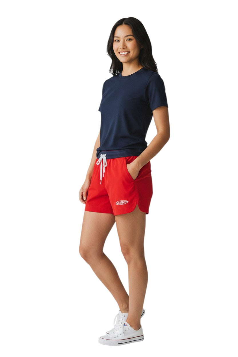 RISE Guard red polyester roll shorts with navy waistband and white drawstring, 4-inch inseam.