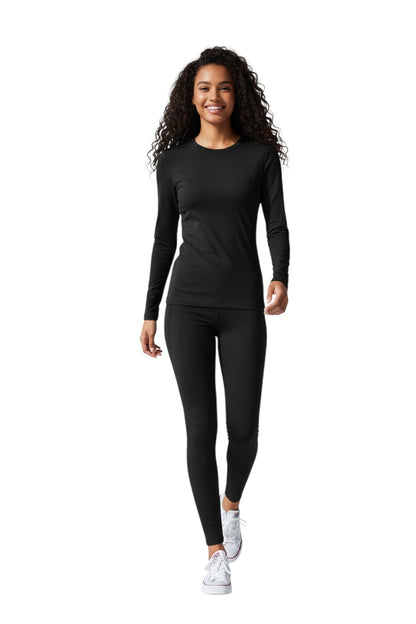 RISE Solid Long Sleeve Crew Neck Rashguard in black, shown on model