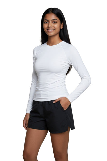 RISE Solid Long Sleeve Crew Neck Rashguard in white, shown on model