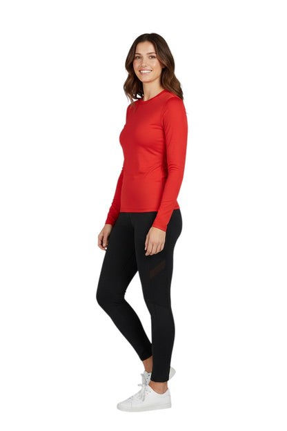 RISE Solid Long Sleeve Crew Neck Rashguard in red, shown on model