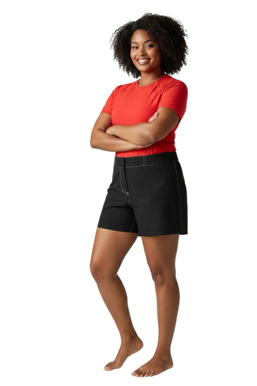 RISE Solid Female Flex Short, black polyester-spandex blend with 5" inseam and storage pocket.