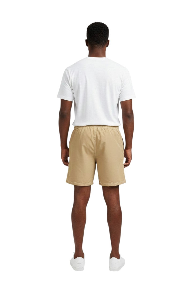 Solid Male Flex Short in tan, made of polyester and spandex blend, with elastic waistband and velcro pocket.