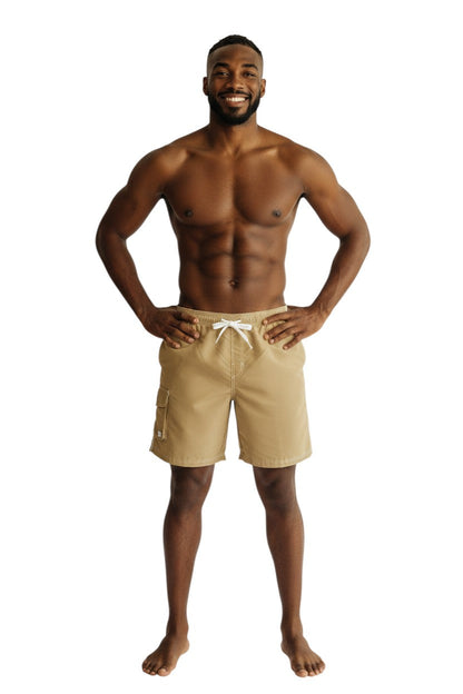 Solid Male Flex Short in tan polyester with white drawstring, contrast stitching, and side pocket.